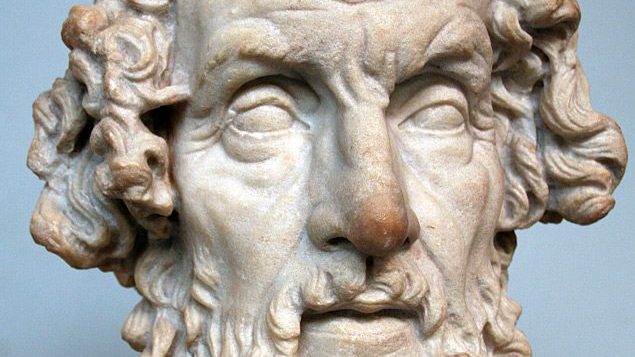 Marble bust of Homer, the ancient Greek poet, showing the traditional depiction of a bearded, blind bard with deeply carved features.
